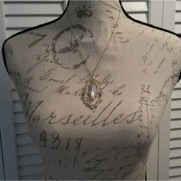 Alexis Bittar Frosted White Lucite with Crystals Necklace in gold setting.
